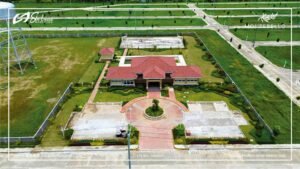 Aerial view of the community clubhouse and surrounding landscaped grounds at Montebello Residences