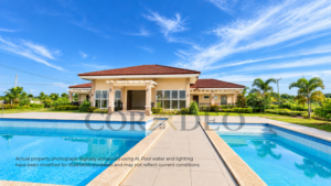 Clubhouse with two swimming pools and landscaped surroundings at Montebello Residences